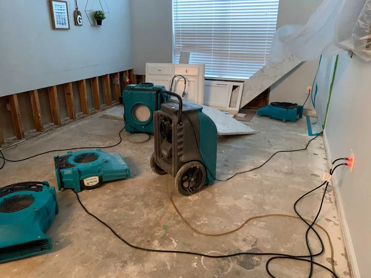Dehumidifier in flood-cut room for Water Damage Restoration in Madison